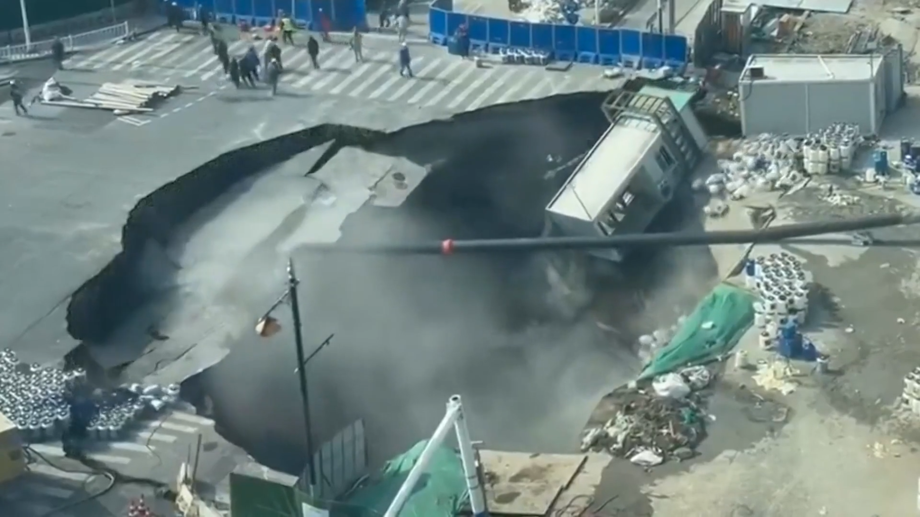 Shocking footage: Shanghai road collapses into sinkhole during metro construction